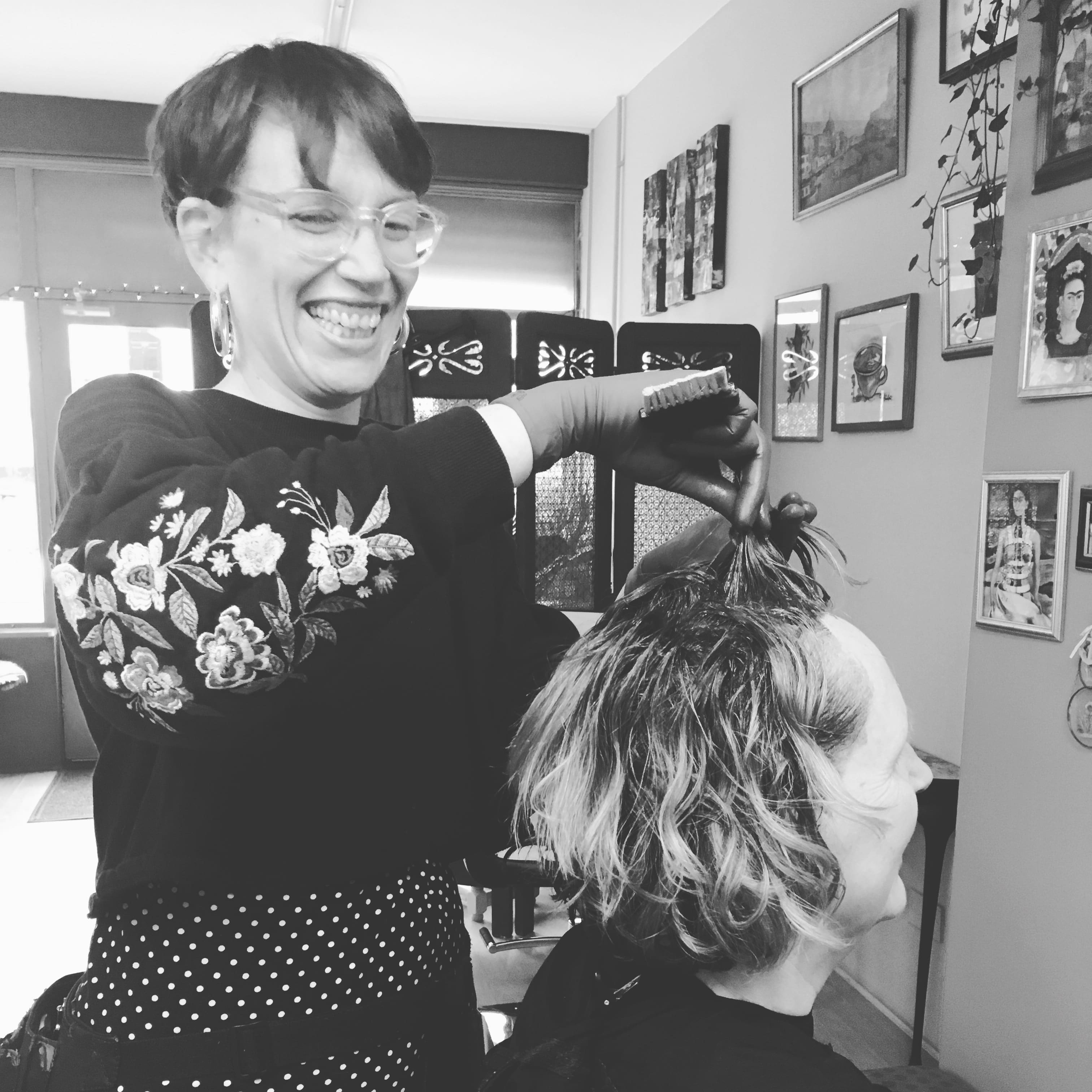 A woman cutting hair